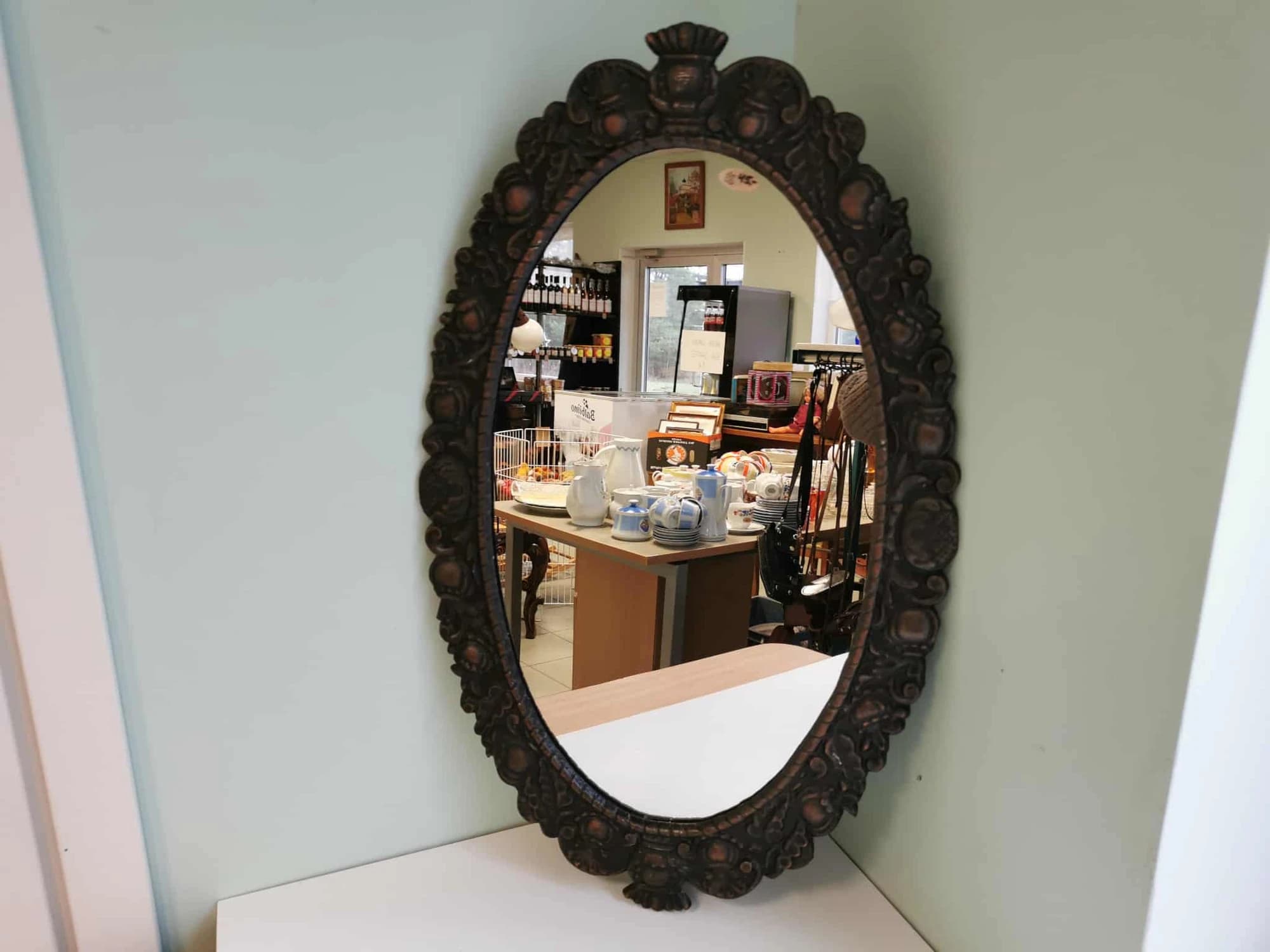 Metallraamiga seinapeegel